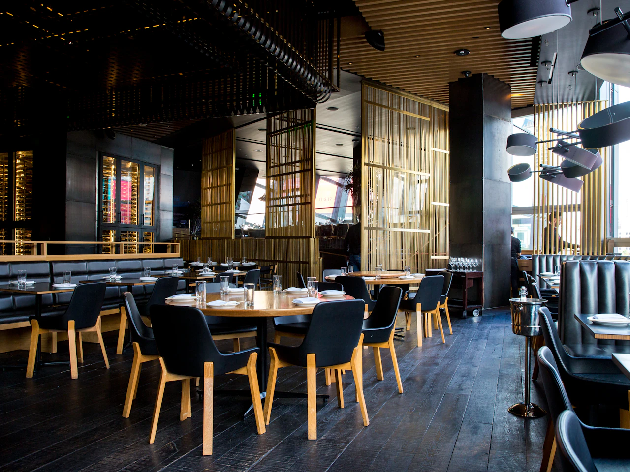 Warm restaurant interior with dining tables ready for guests.